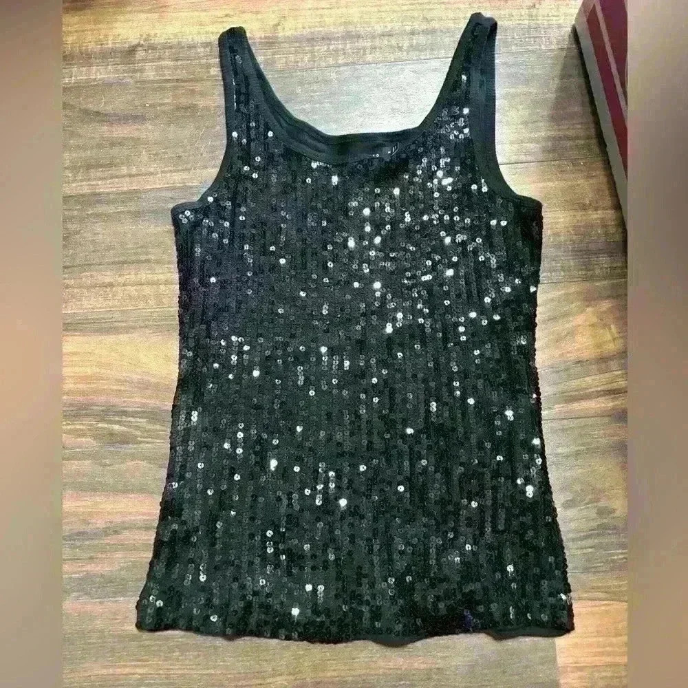 The Limited size Medium sequined black tank top. Timeless!